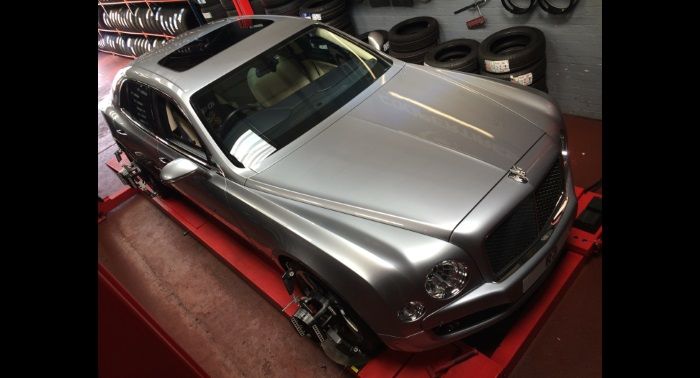 Tyre-Smart (Essex) Car on ramp for wheel alignment