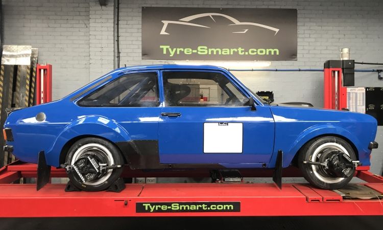 Escort Mk2 on ramp for wheel alignment